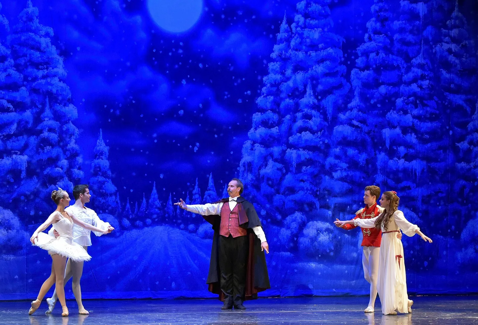 Dancers on stage in a production of The Nutcracker by New Mexico Dance Theater