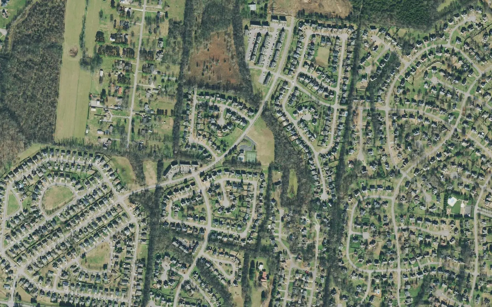 Homes in Newport Crossing and neighboring subdivisions off Buckner Lane in north Spring Hill, in a 2021 aerial photograph.