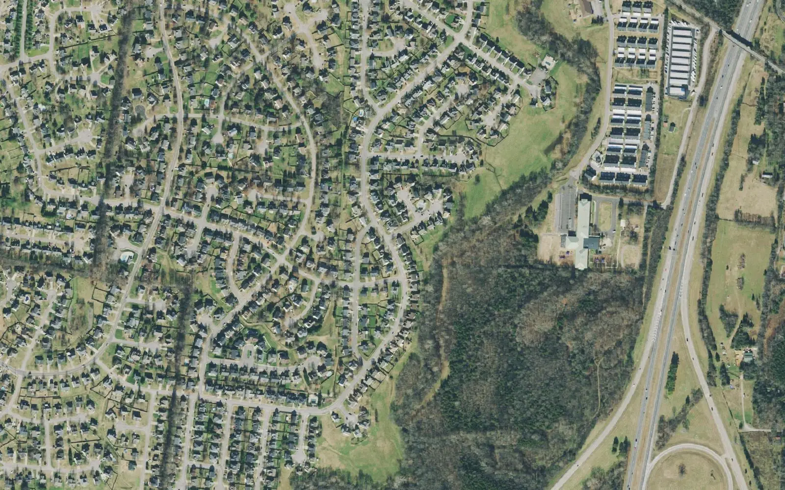Homes in Chapman's Retreat and neighboring subdivisions off Buckner Lane in east Spring Hill, in a 2021 aerial photograph.