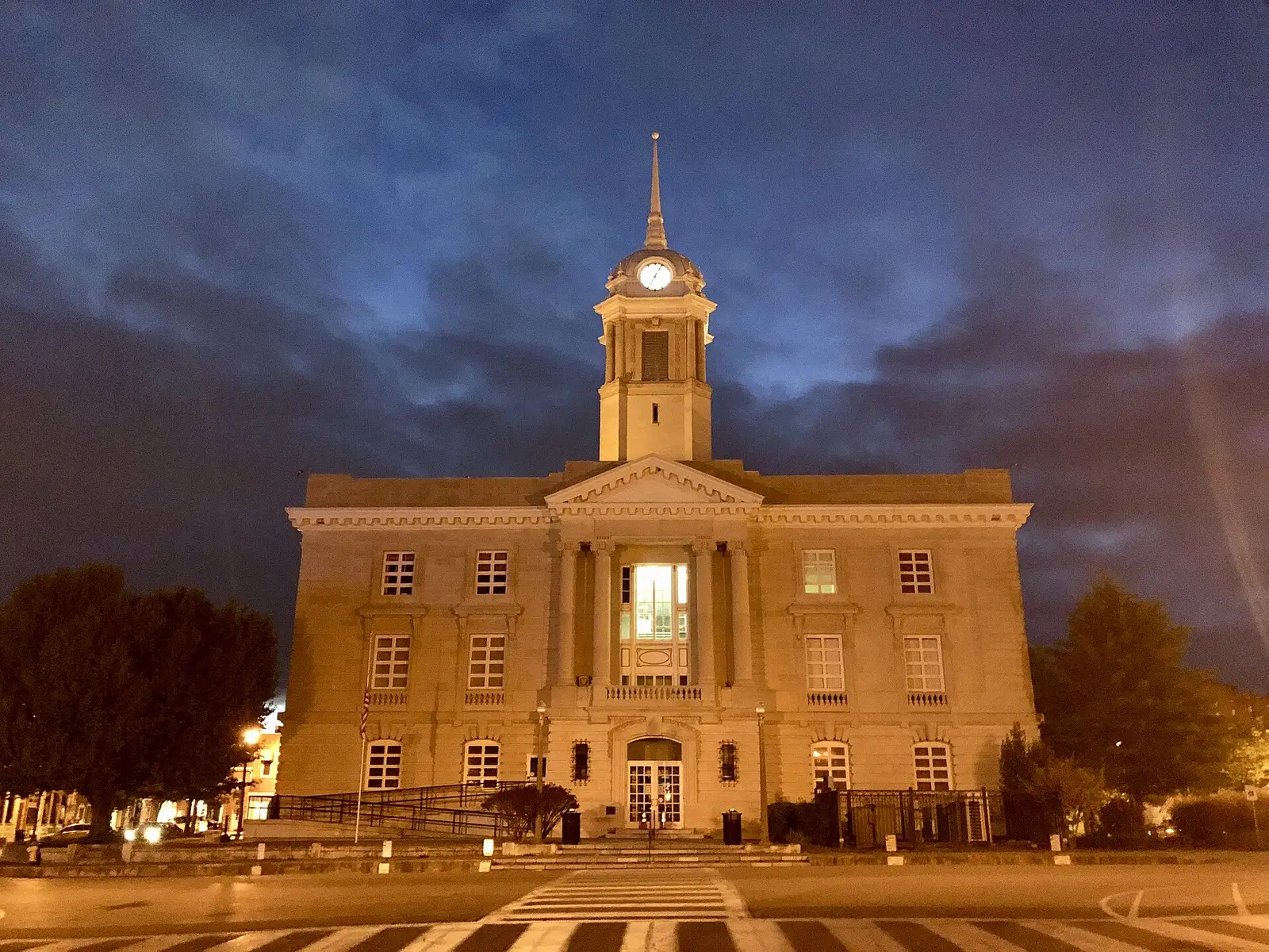The Maury County Courthouse on the Public Square in Columbia, lit at night; the Maury County Trustee's office is at 1 Public Square