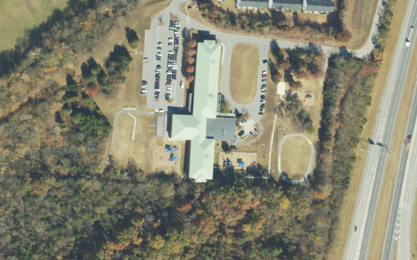 Chapman's Retreat Elementary School beside Interstate 65 on Secluded Lane in Spring Hill, seen from the air