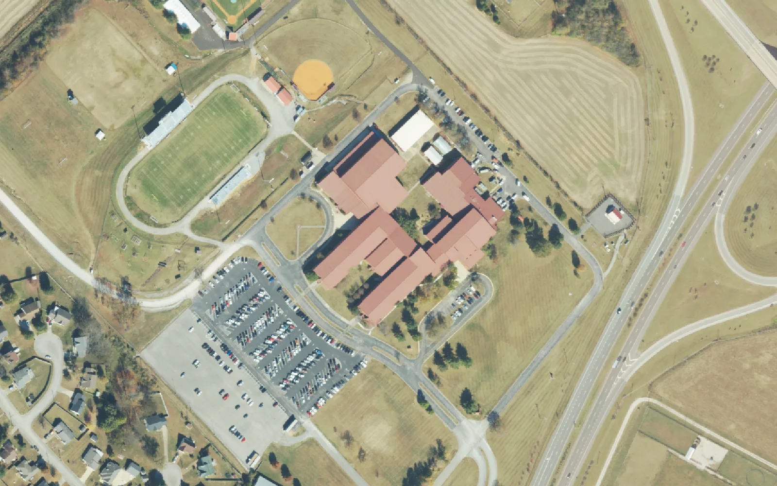 Spring Hill High School, its football field and parking lots off Raider Lane, seen from the air